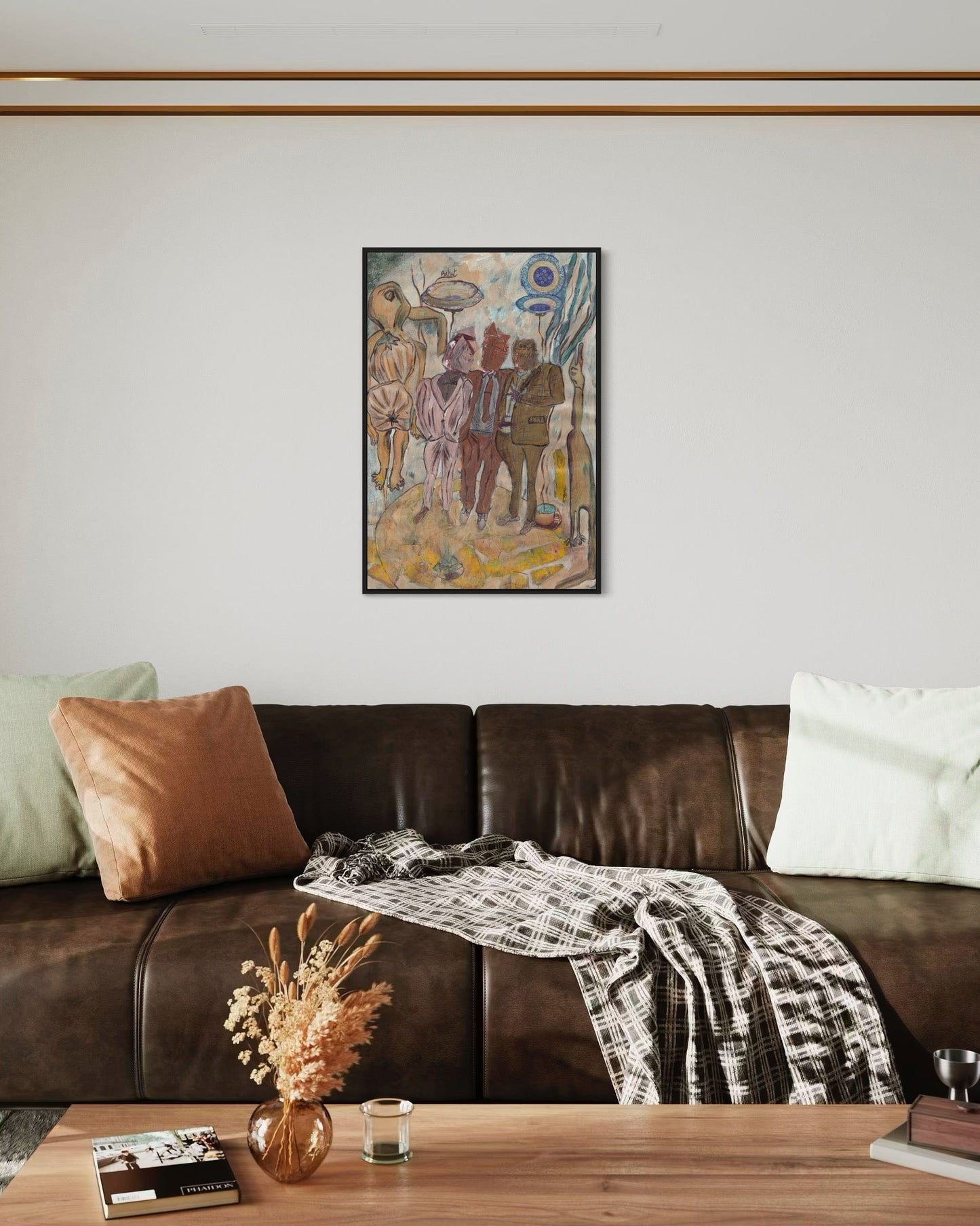 Living room with a brown leather sofa, decorative pillows, and a painting on the wall.
