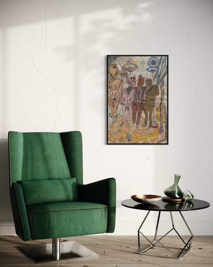 Green armchair in a room with a table and artwork on the wall