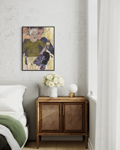 Room interior with a bed, wooden cabinet, and framed artwork on the wall.