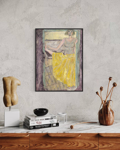 Framed artwork of a woman in a yellow dress on a wall above a wooden shelf with decor items.