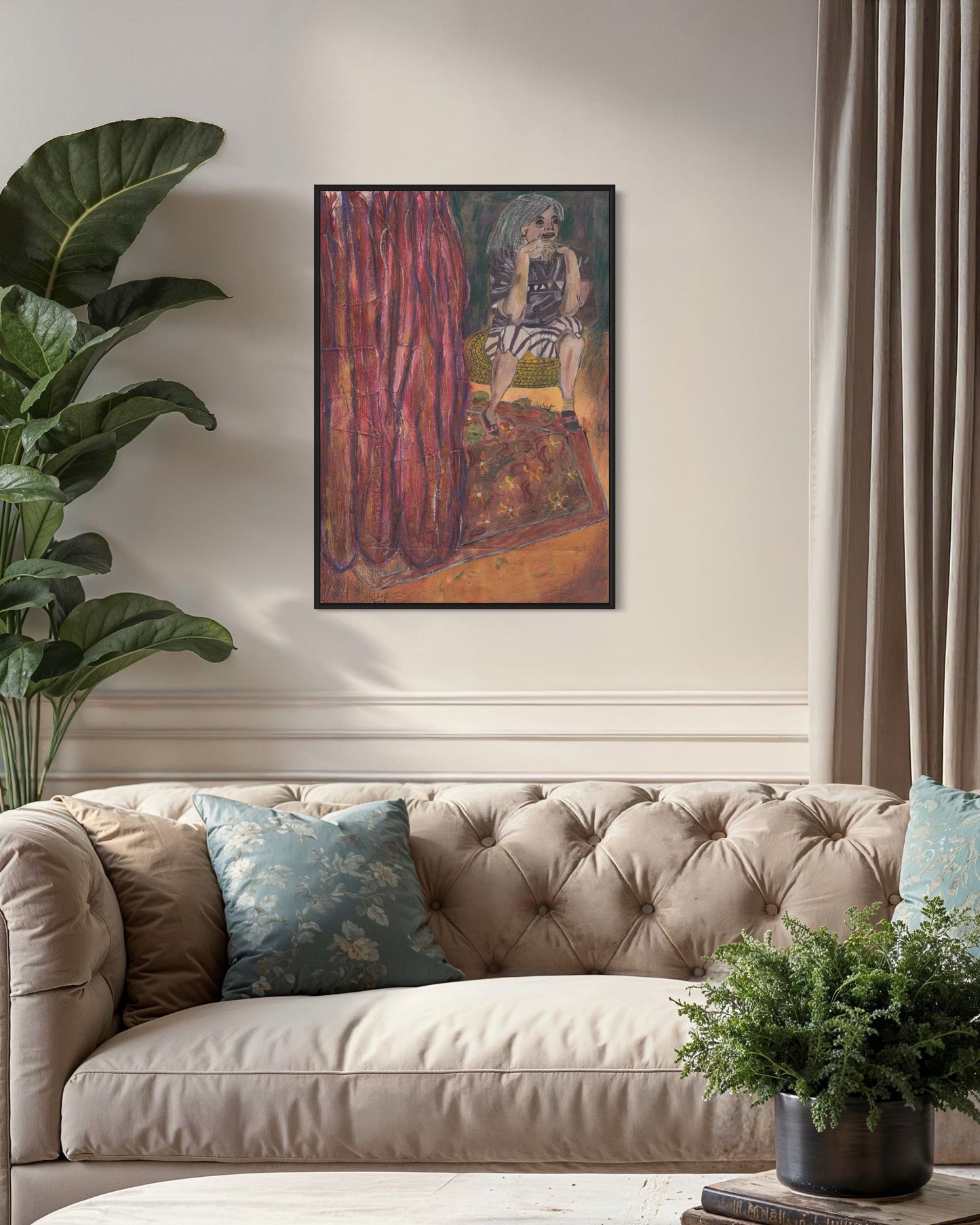 Framed artwork above a beige sofa in a living room with plants and decor.
