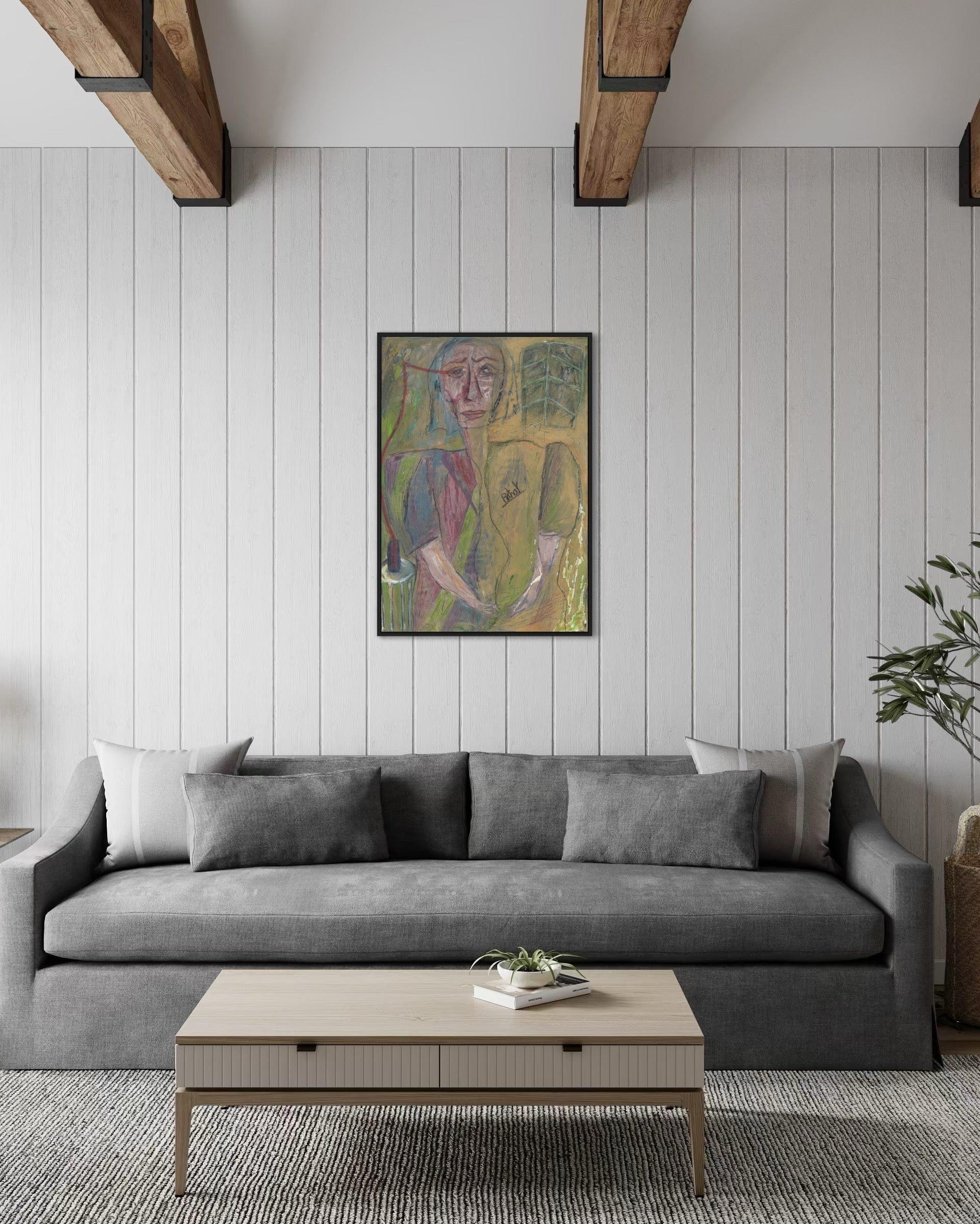 Living room with a gray sofa, wooden coffee table, and abstract painting on the wall.