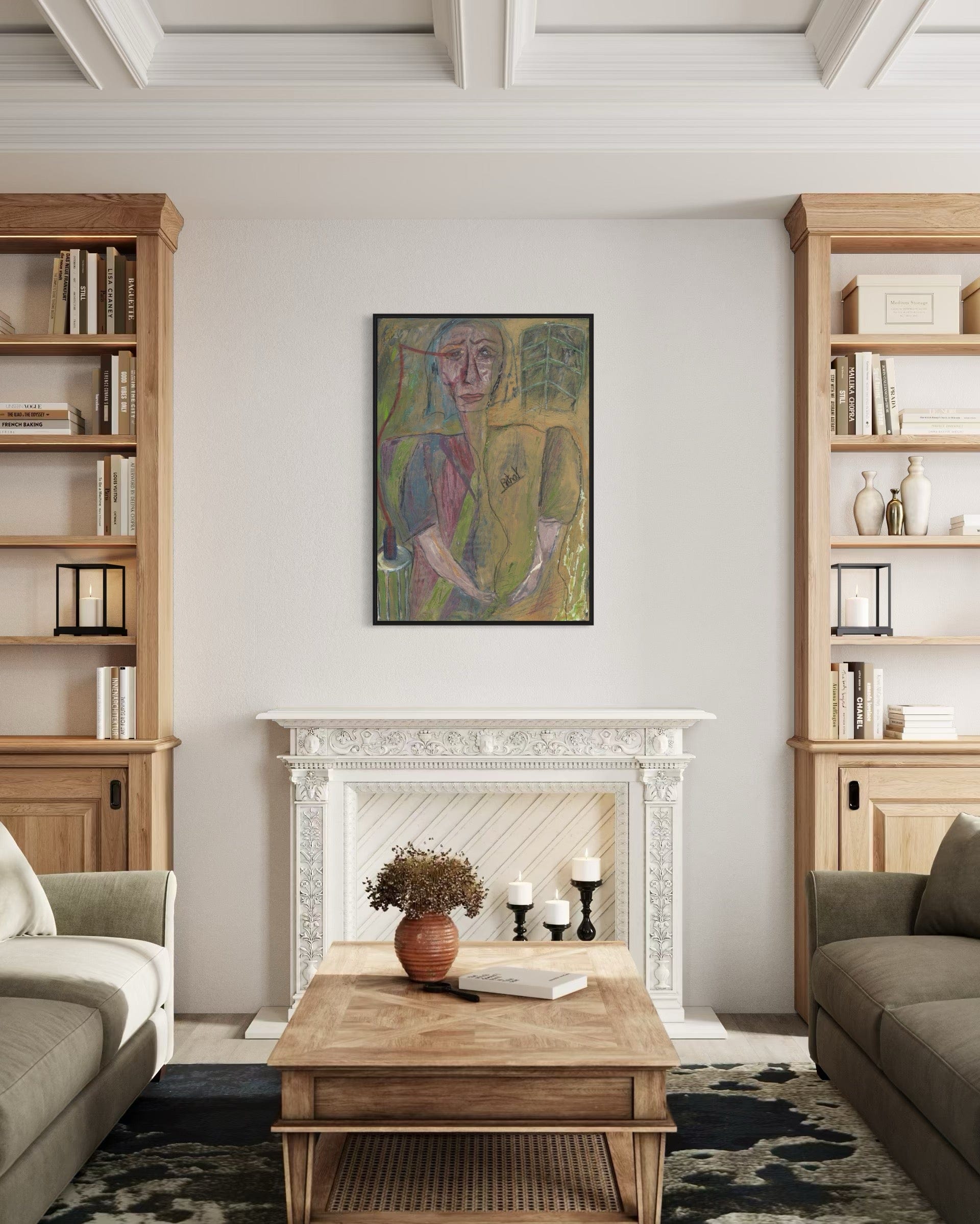 Living room with wooden bookshelves, a fireplace, and a painting on the wall.