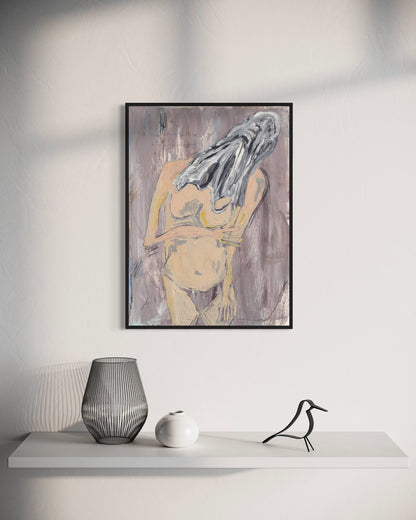 Framed abstract art piece on a wall above a white shelf with decorative items.