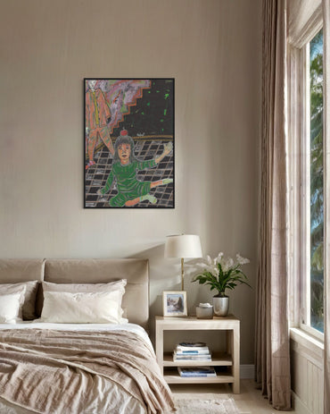 Bedroom with a child's drawing on the wall, lamp, and books on a nightstand.