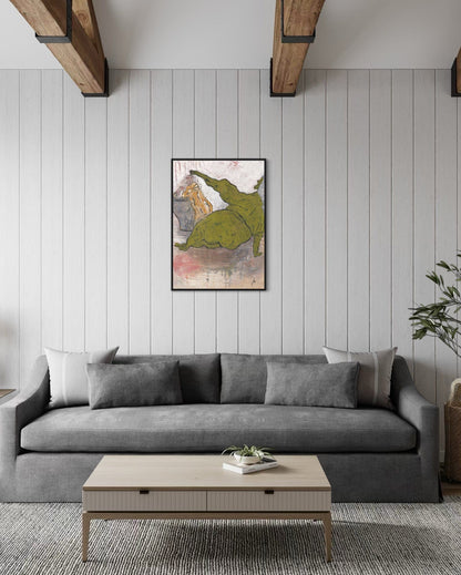 Gray sofa in a living room with a coffee table and decorative elements.