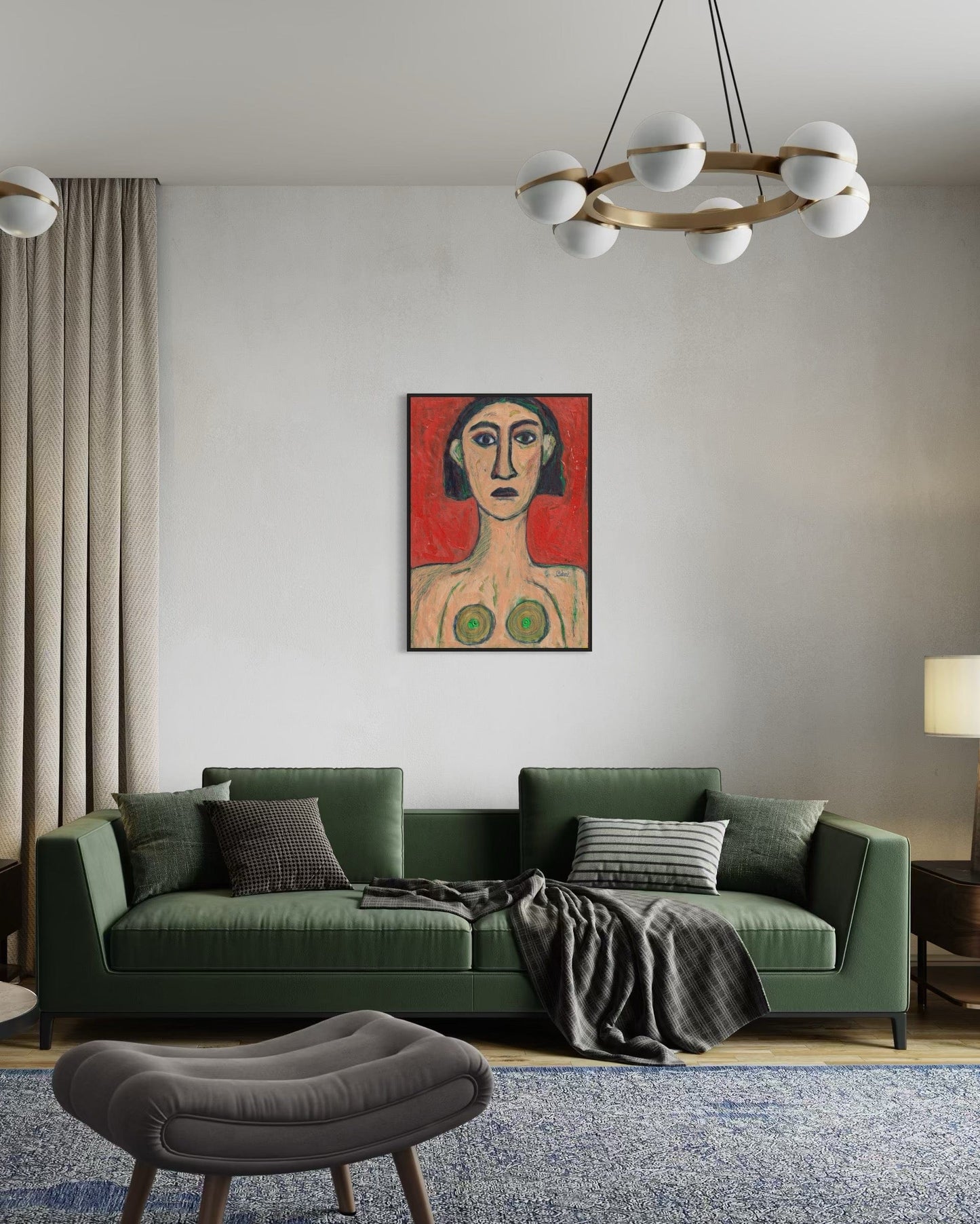 Modern living room with a green sofa, gray ottoman, and a painting on the wall.