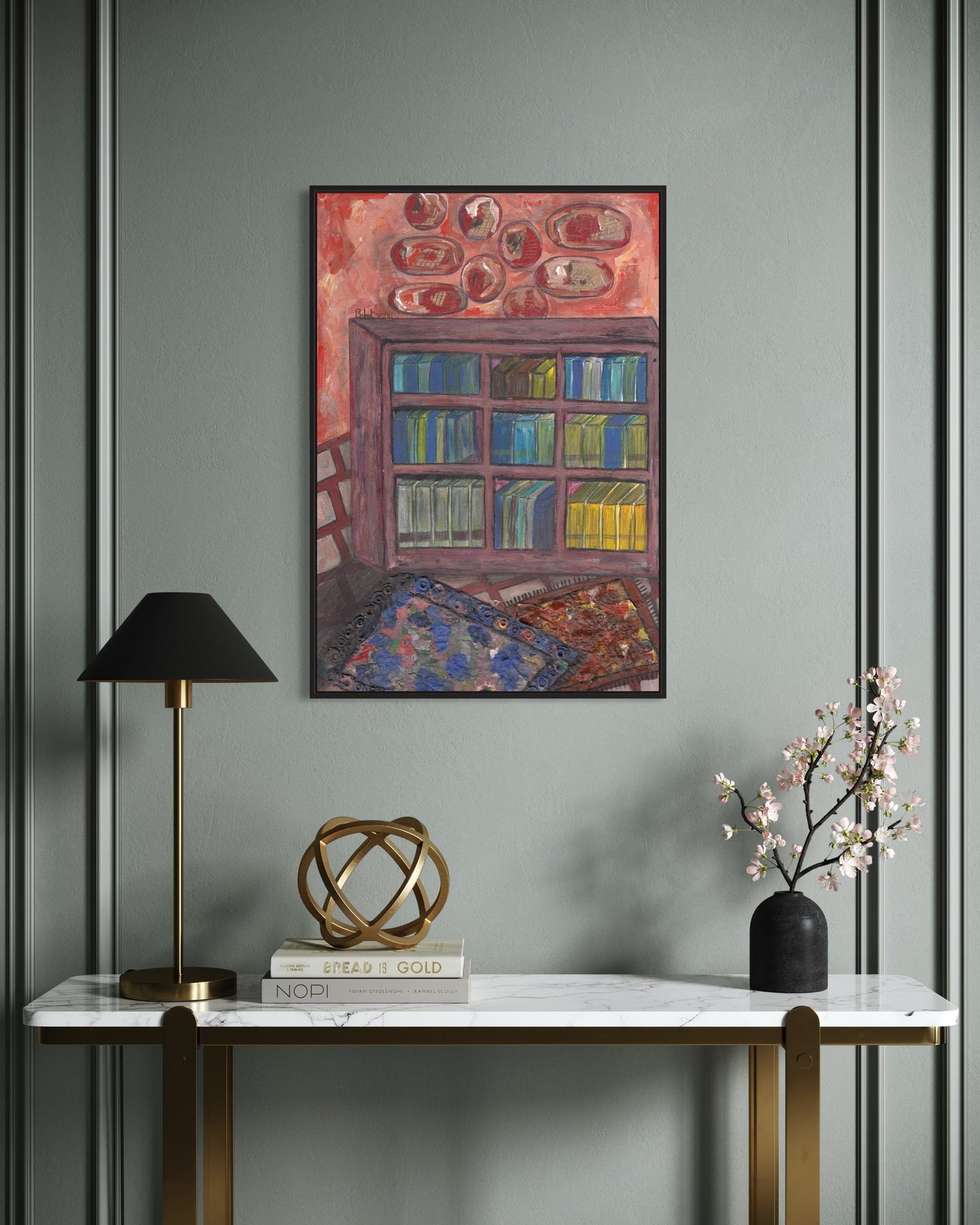 Decorative interior with a painting of a bookshelf, lamp, sculpture, and vase on a marble table against a gray wall.