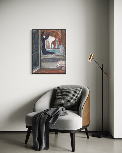 Modern interior with a gray armchair, plaid pillow, and framed artwork on a white wall.