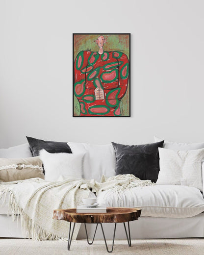 Living room with a white sofa, wooden coffee table, and abstract art on the wall.