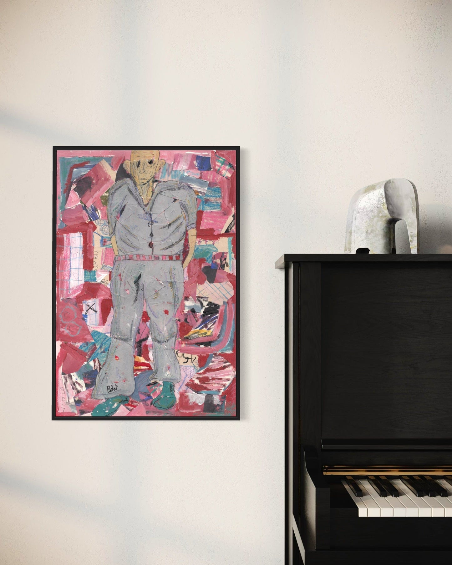Abstract painting of a figure with colorful background on a wall above a piano