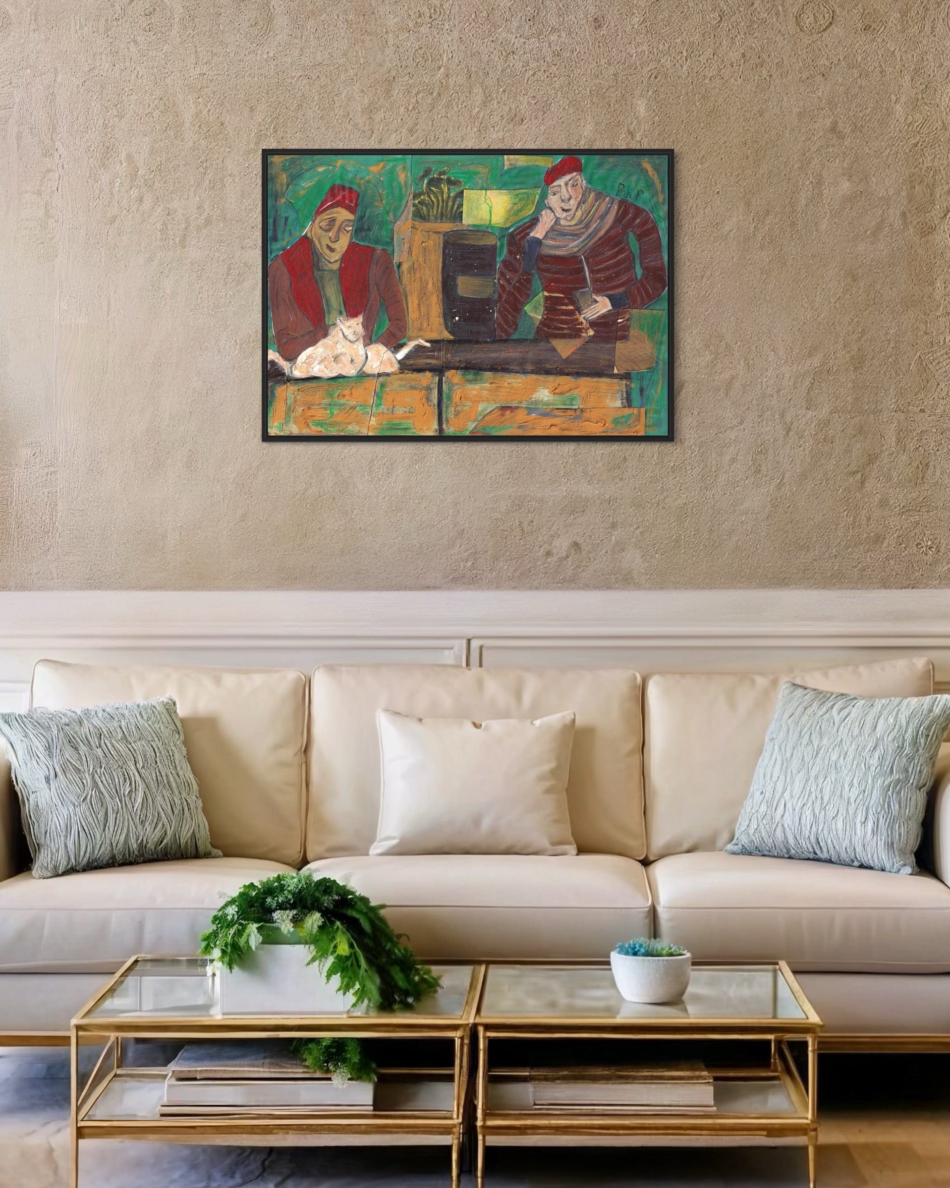 Living room with a beige sofa, decorative pillows, and a painting on the wall.