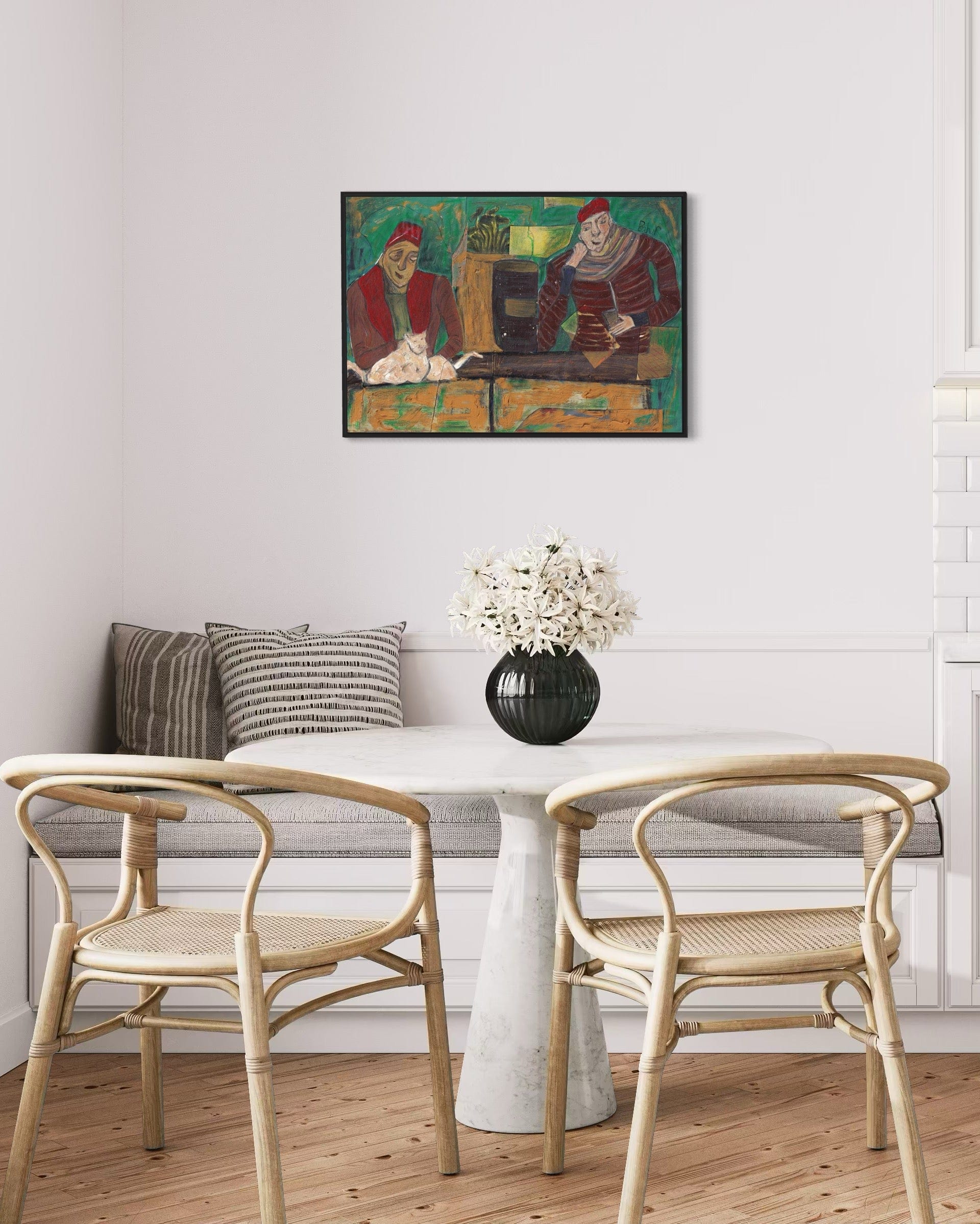Dining room with a table, chairs, and a colorful painting on the wall.