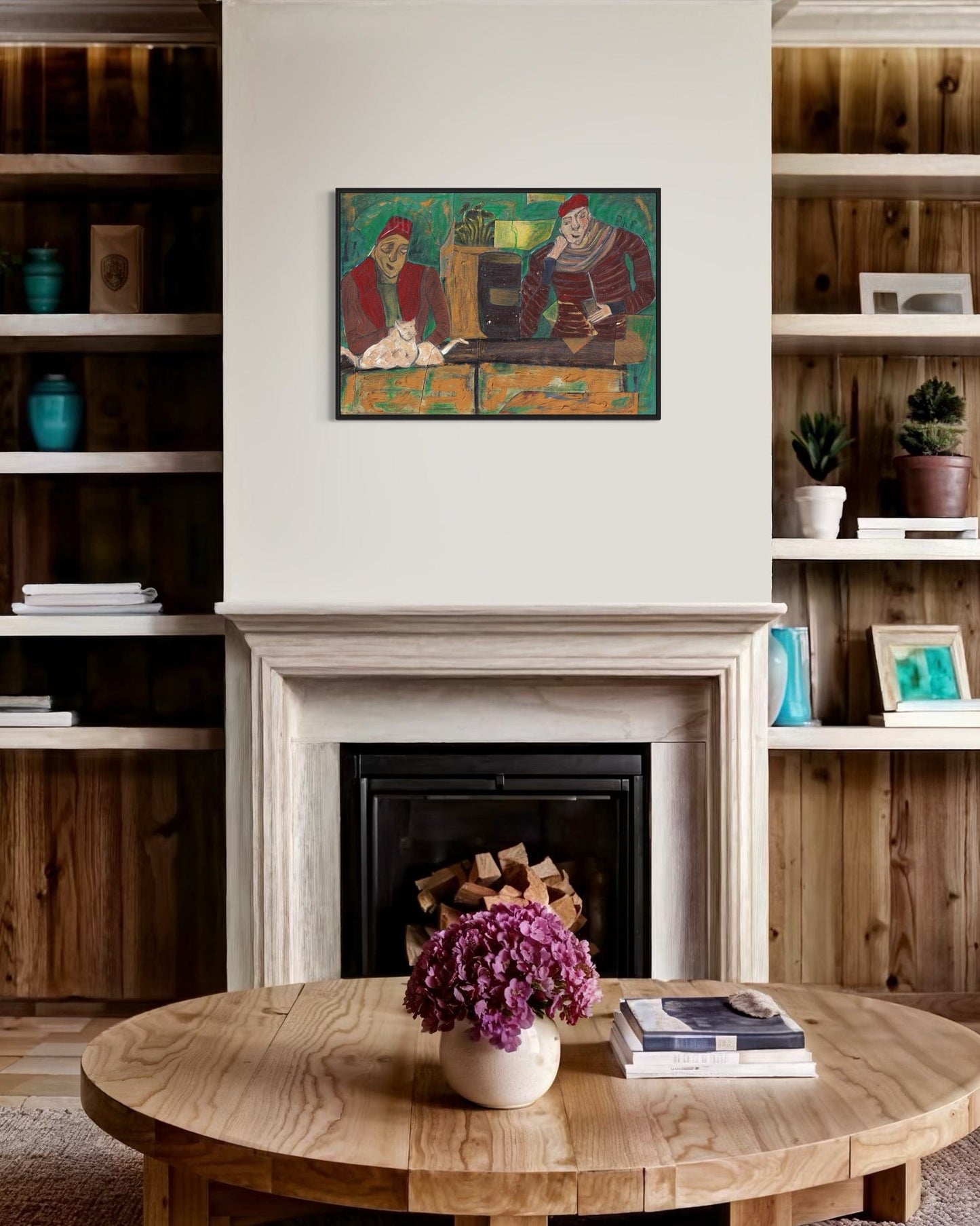 Living room with wooden coffee table, fireplace, and wall art
