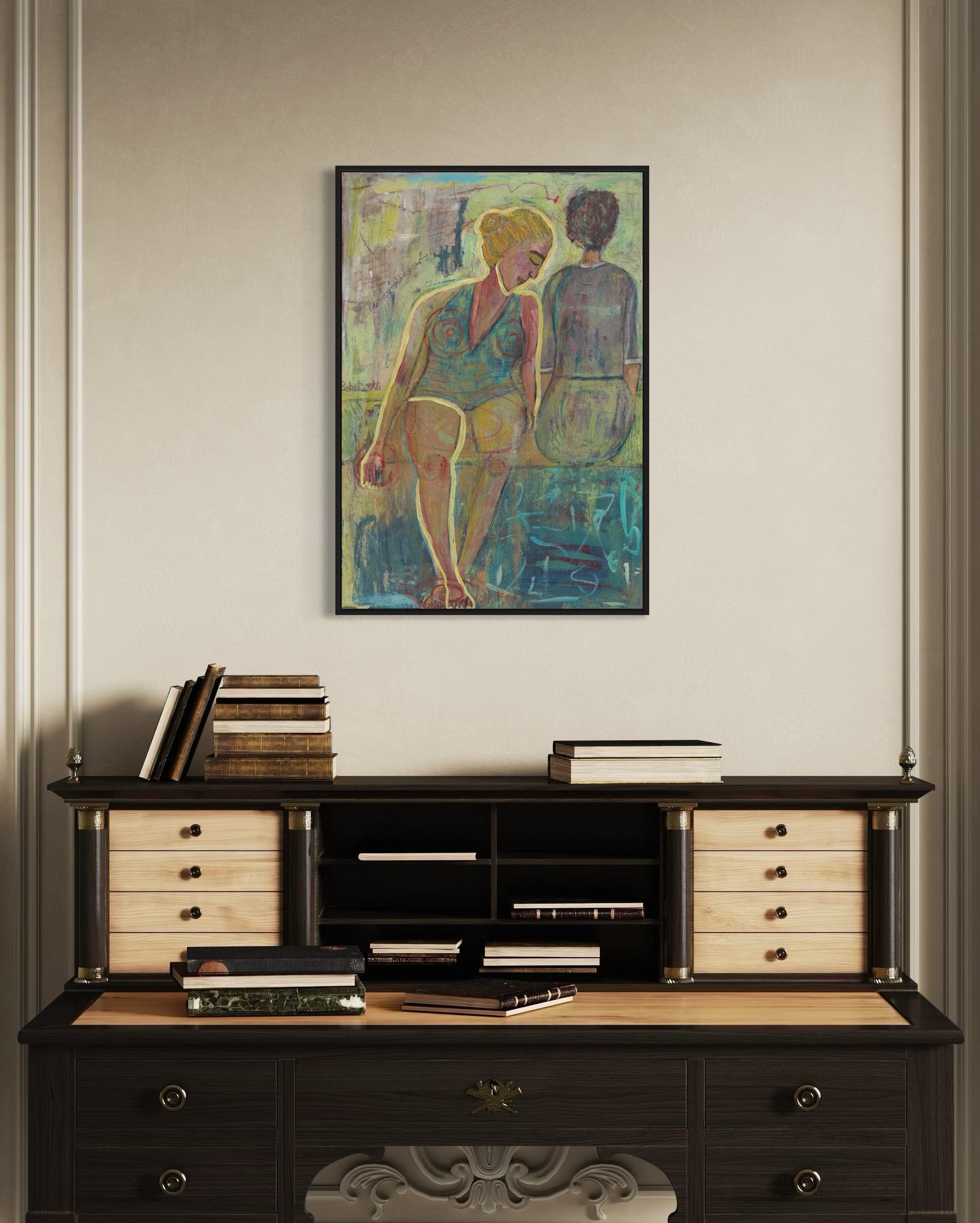 Wooden desk with books and a framed abstract painting on the wall.