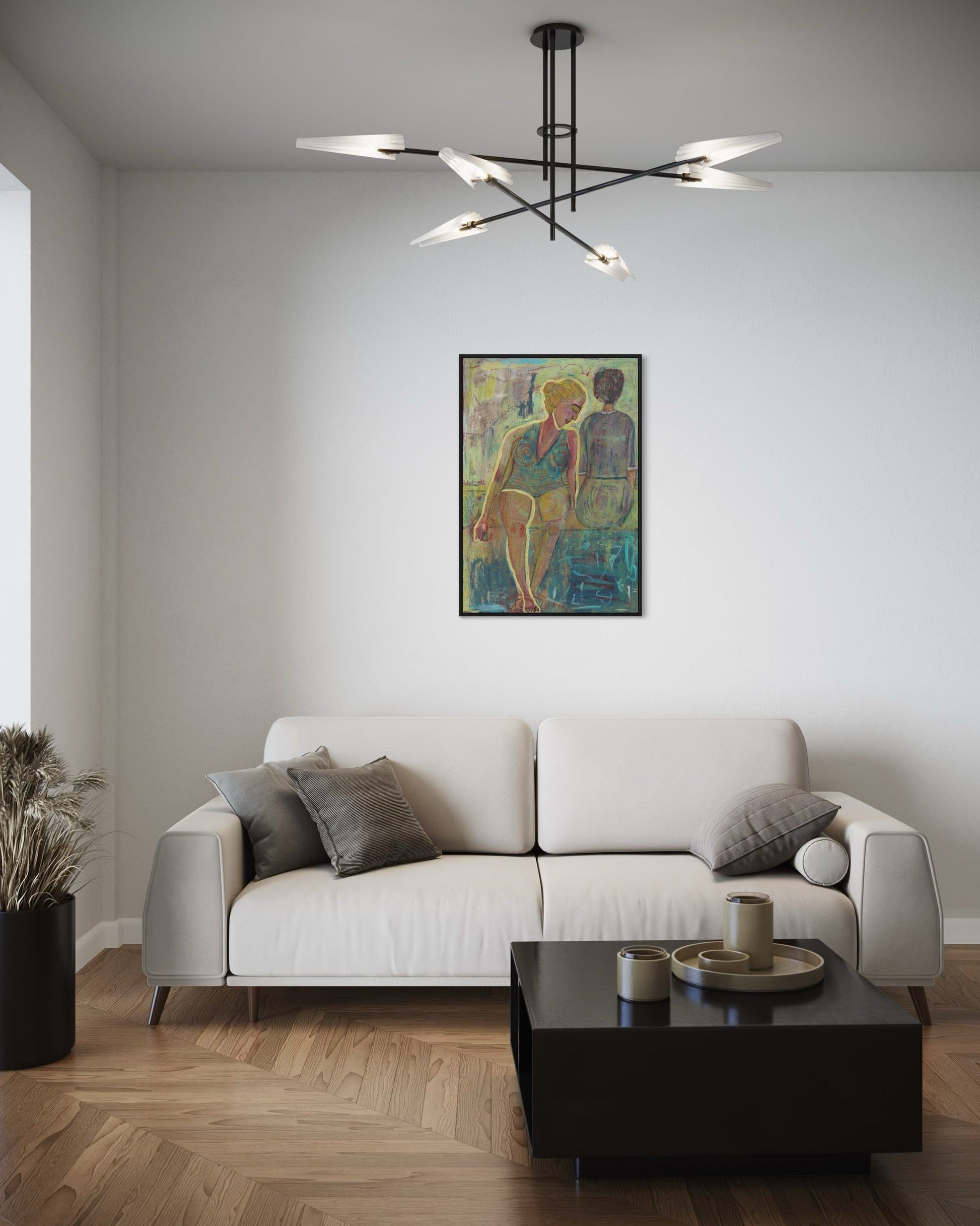 Modern living room with a white sofa, coffee table, and colorful painting on the wall.