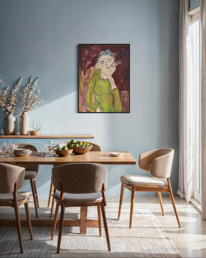 Dining room with wooden table and chairs, artwork on the wall, and natural light.