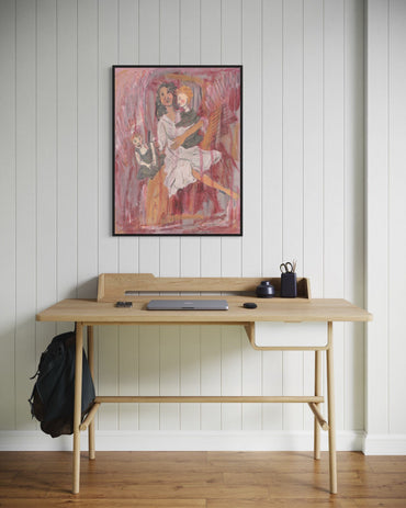 Wooden desk with a backpack and items against a white paneled wall with a framed painting.