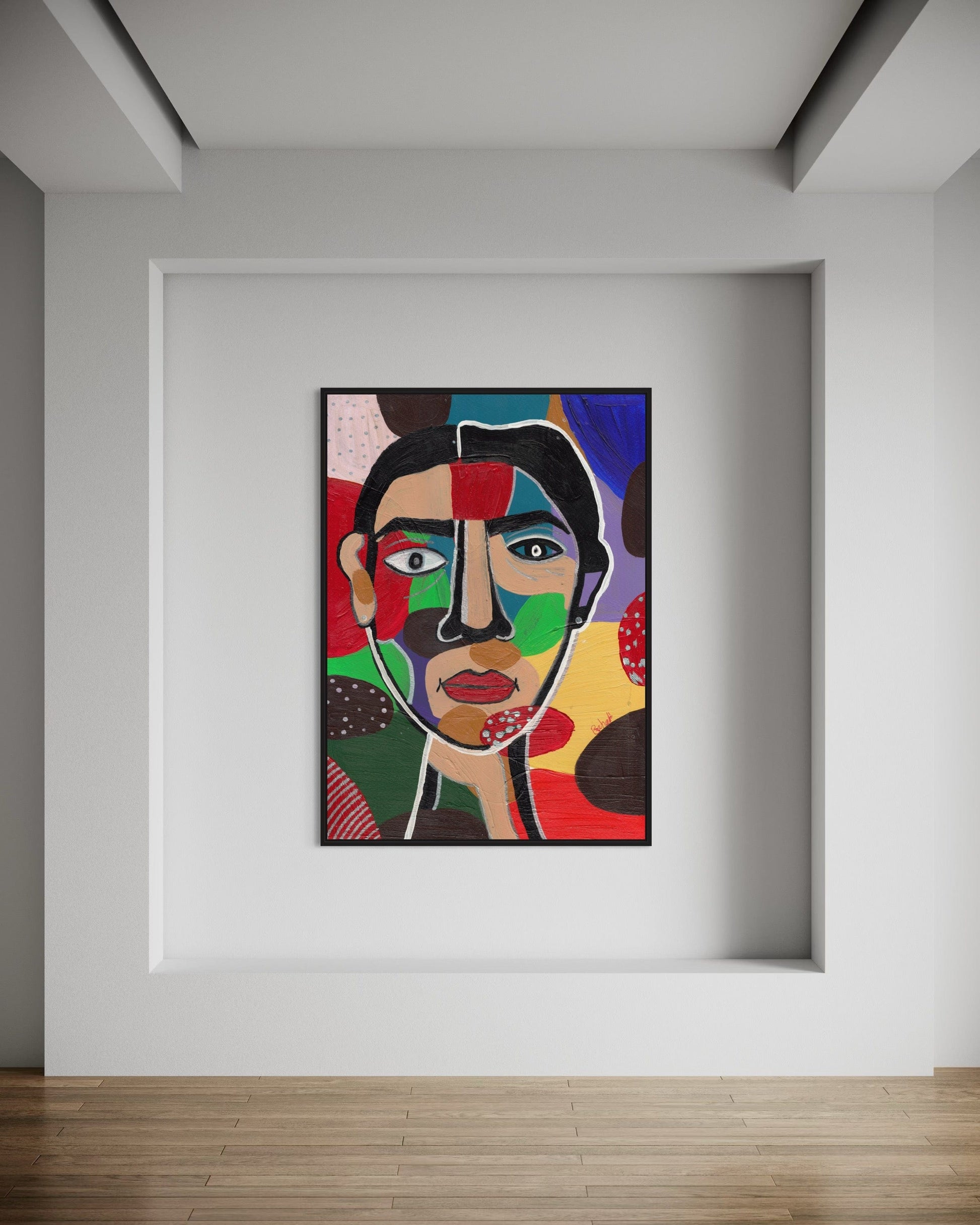 Colorful abstract art piece on a white wall