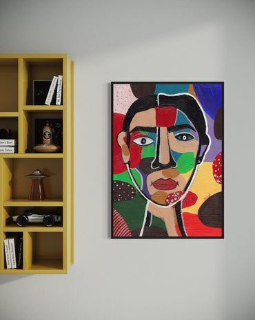 Colorful abstract portrait on a wall next to a yellow bookshelf.