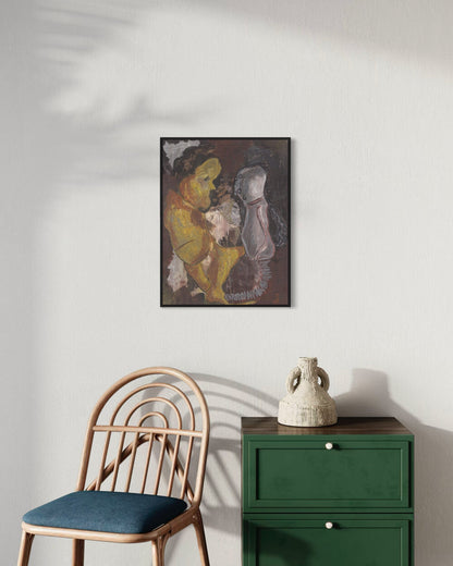 Framed artwork on a wall above a green cabinet and wooden chair.