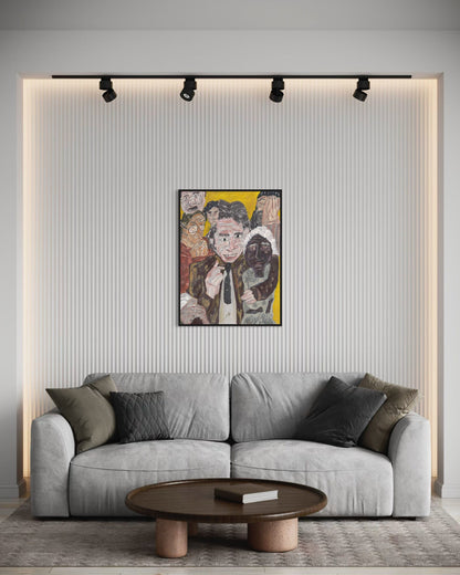 Gray sofa in a living room with a colorful painting on the wall.