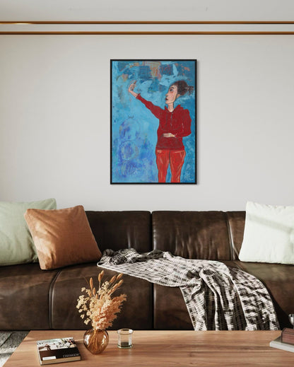Living room with a brown leather sofa, wooden coffee table, and a colorful abstract painting of a woman on the wall.