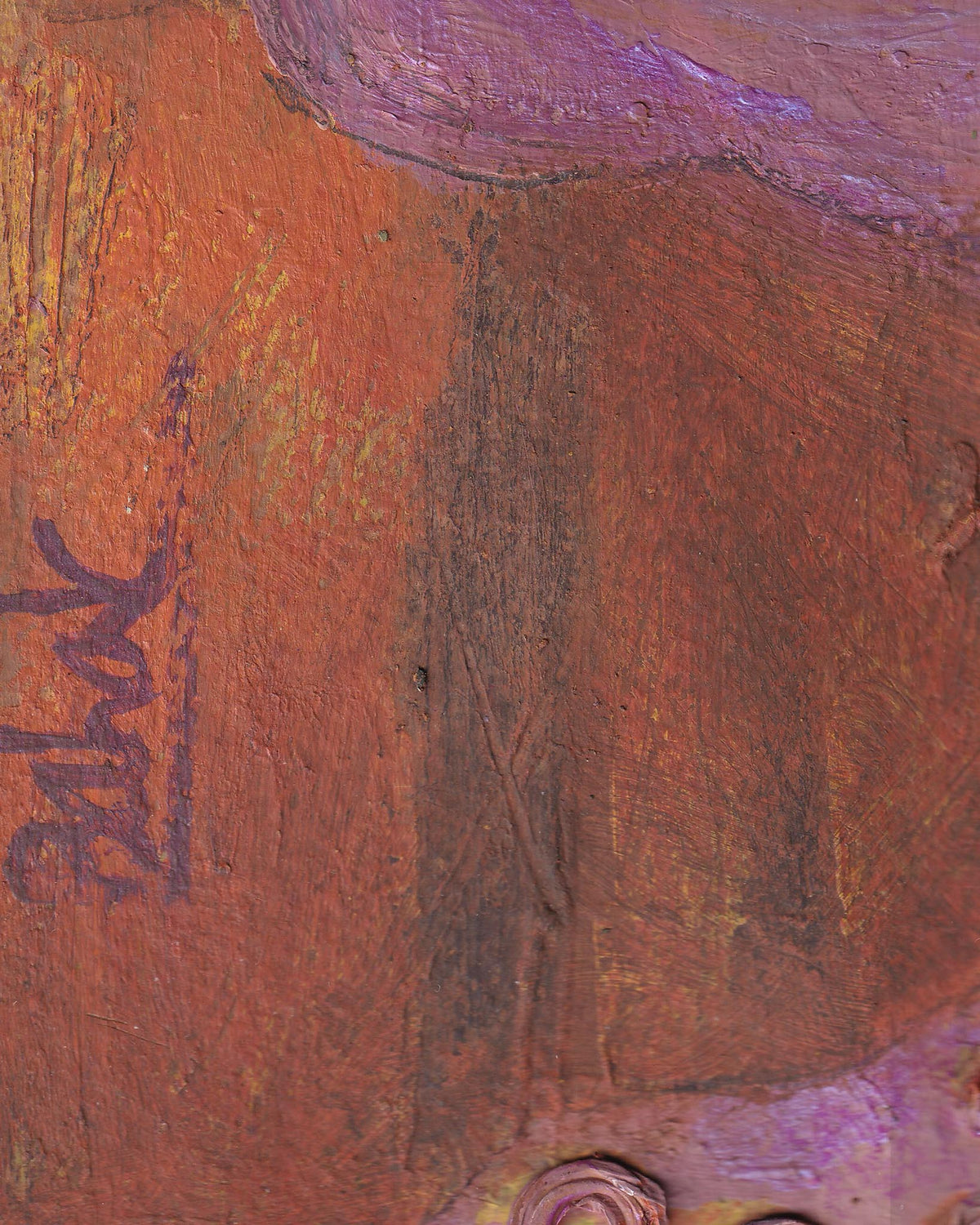 Close-up of a textured surface with an artist's signature in purple.