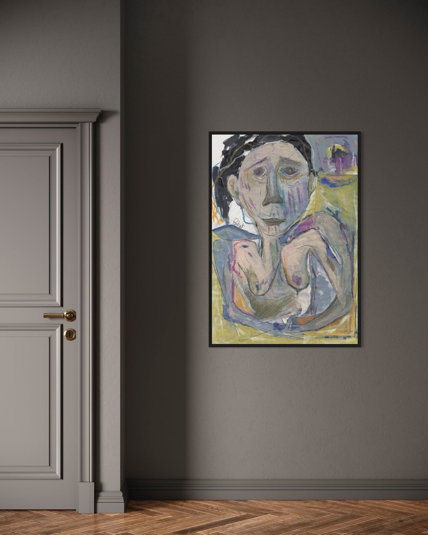 Framed abstract painting on a gray wall next to a door.