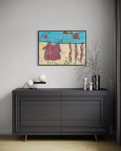 Modern interior with a black dresser, abstract painting, and decorative items.