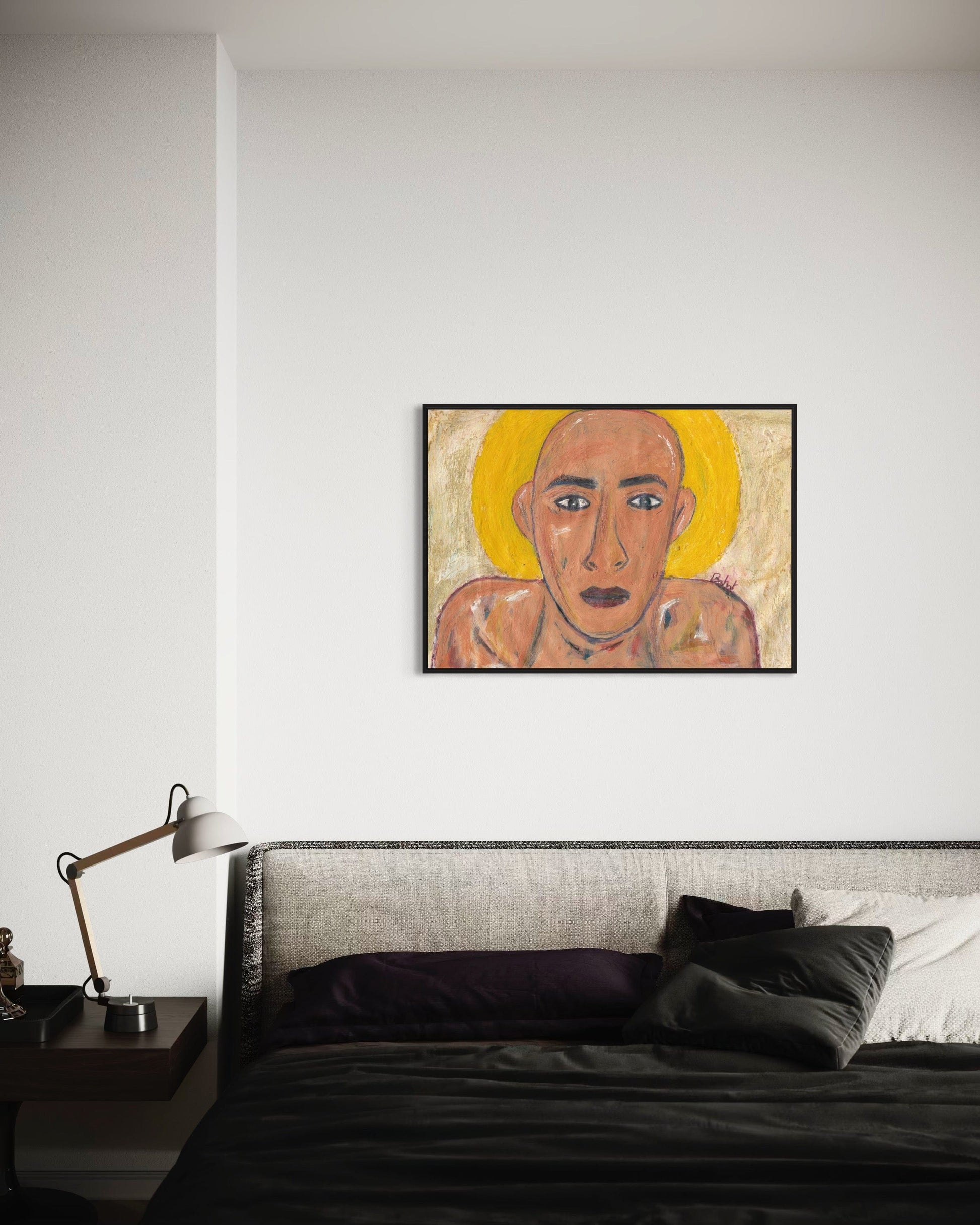Framed artwork above a bed in a bedroom setting