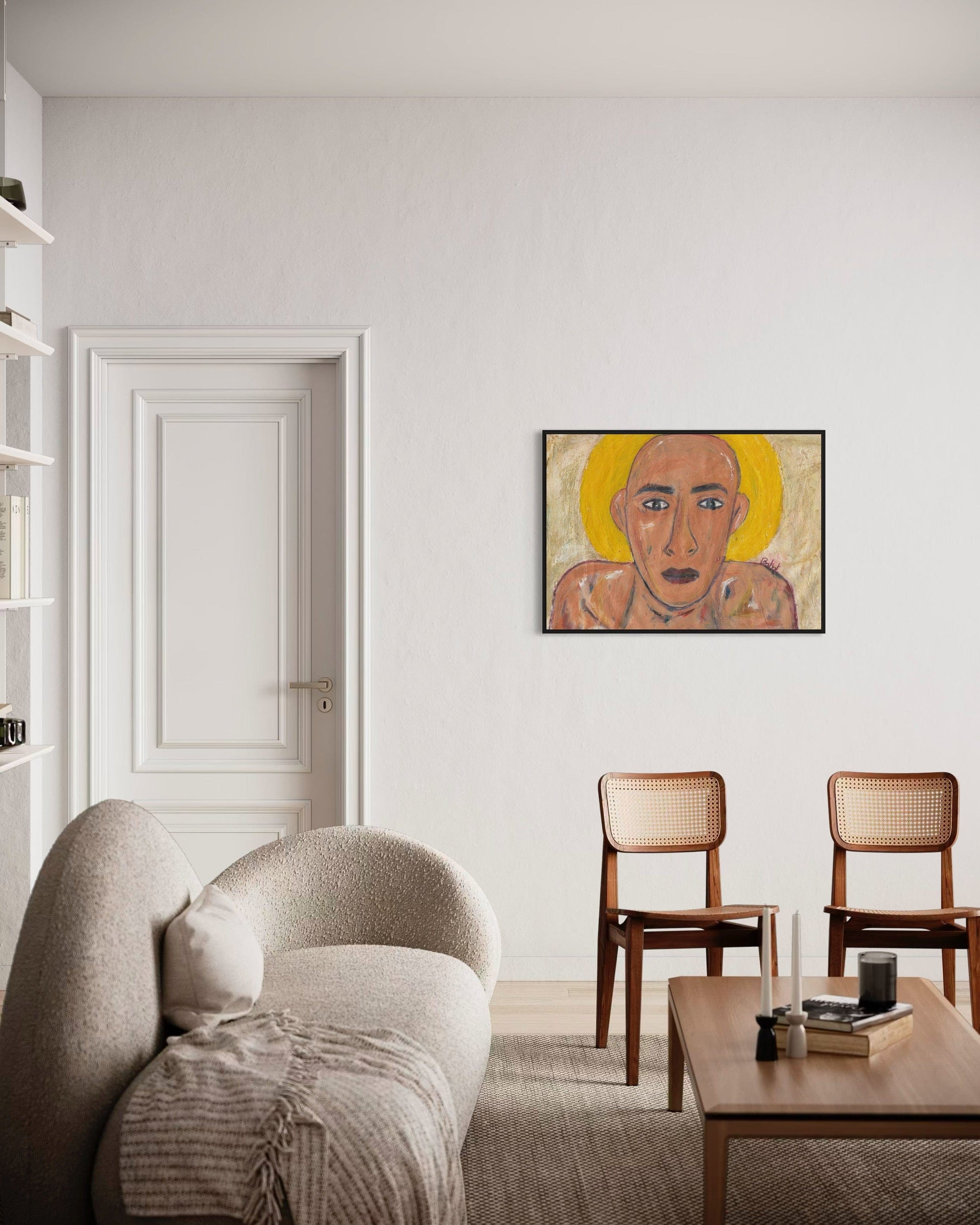 Living room with a beige sofa, wooden coffee table, and chairs, featuring a wall art piece.