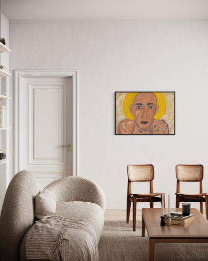 Living room with a beige sofa, wooden coffee table, and chairs, featuring a wall art piece.