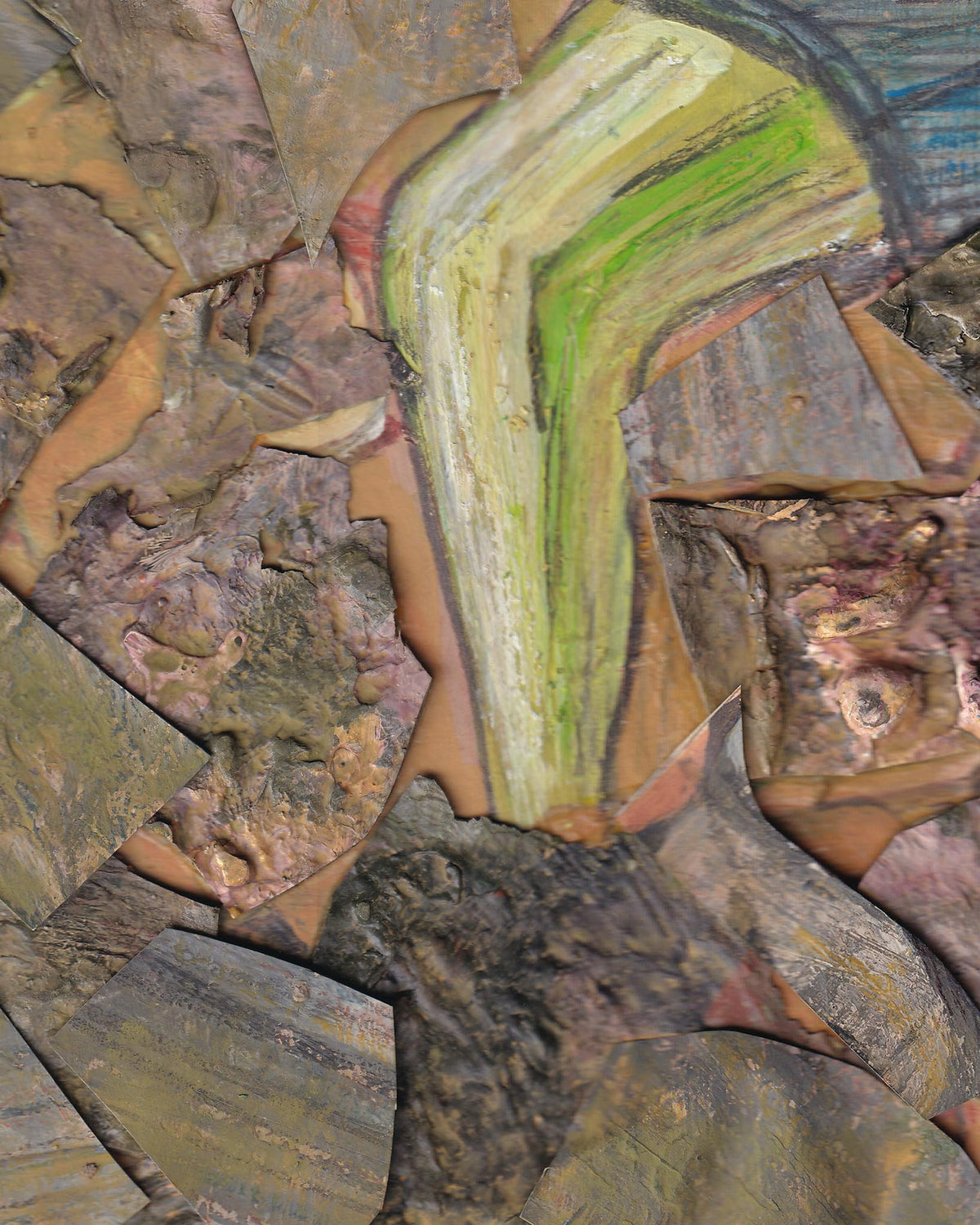 Close-up of layered rock with green and brown colors