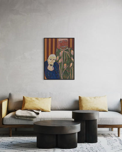 Living room with a gray sofa, gold pillows, and a colorful painting on the wall.