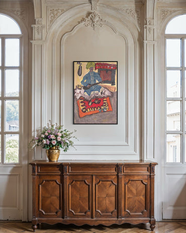Wooden sideboard with a vase of flowers and a colorful painting on a wall in a room with large windows.