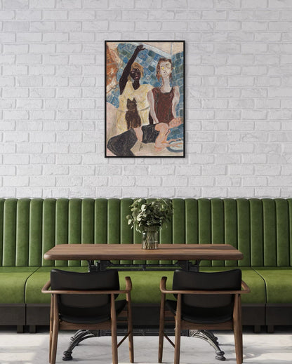 Green booth with wooden table and chairs against a white brick wall with a framed artwork.
