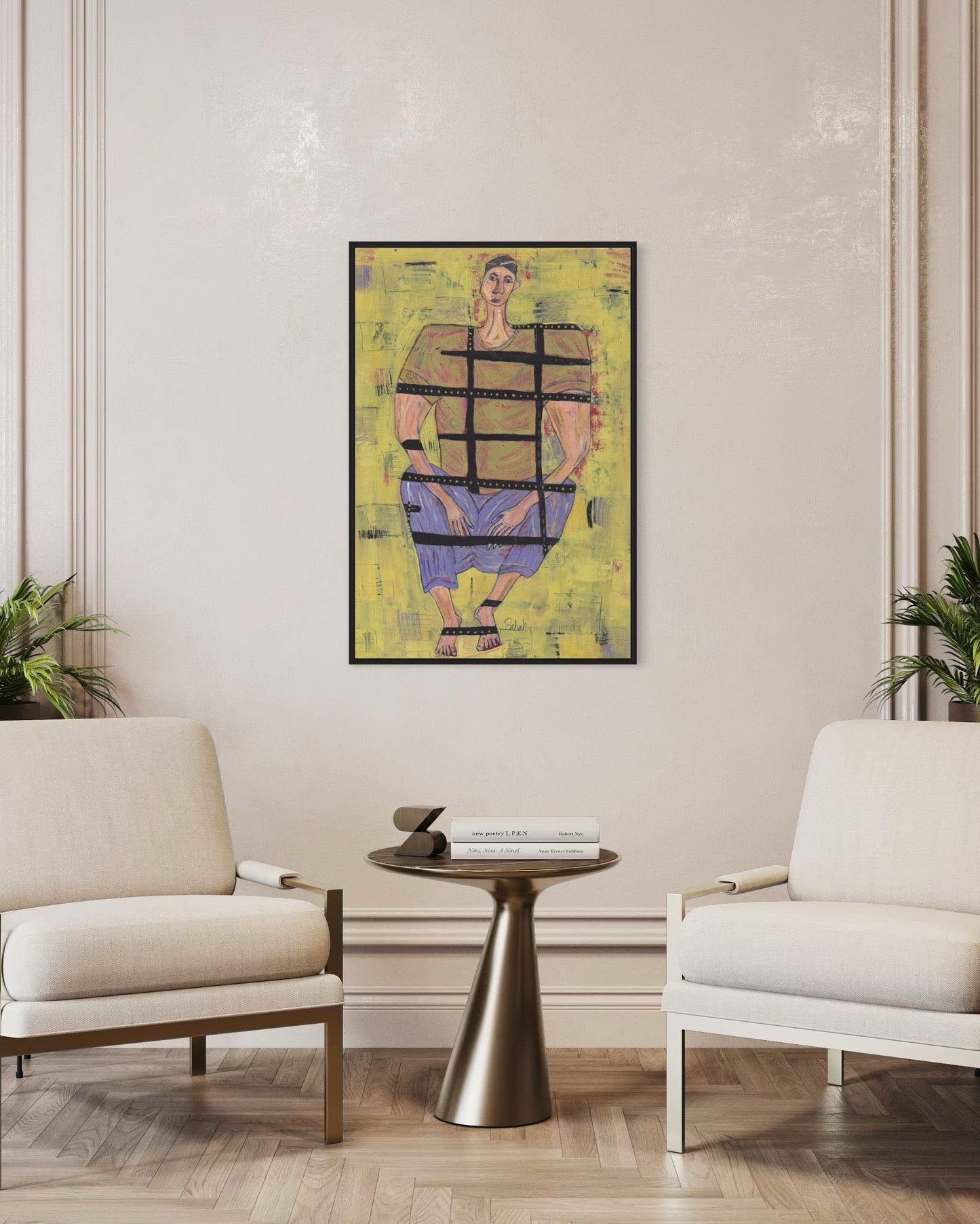 Modern living room with a colorful abstract painting on the wall, two white chairs, and a small round table.