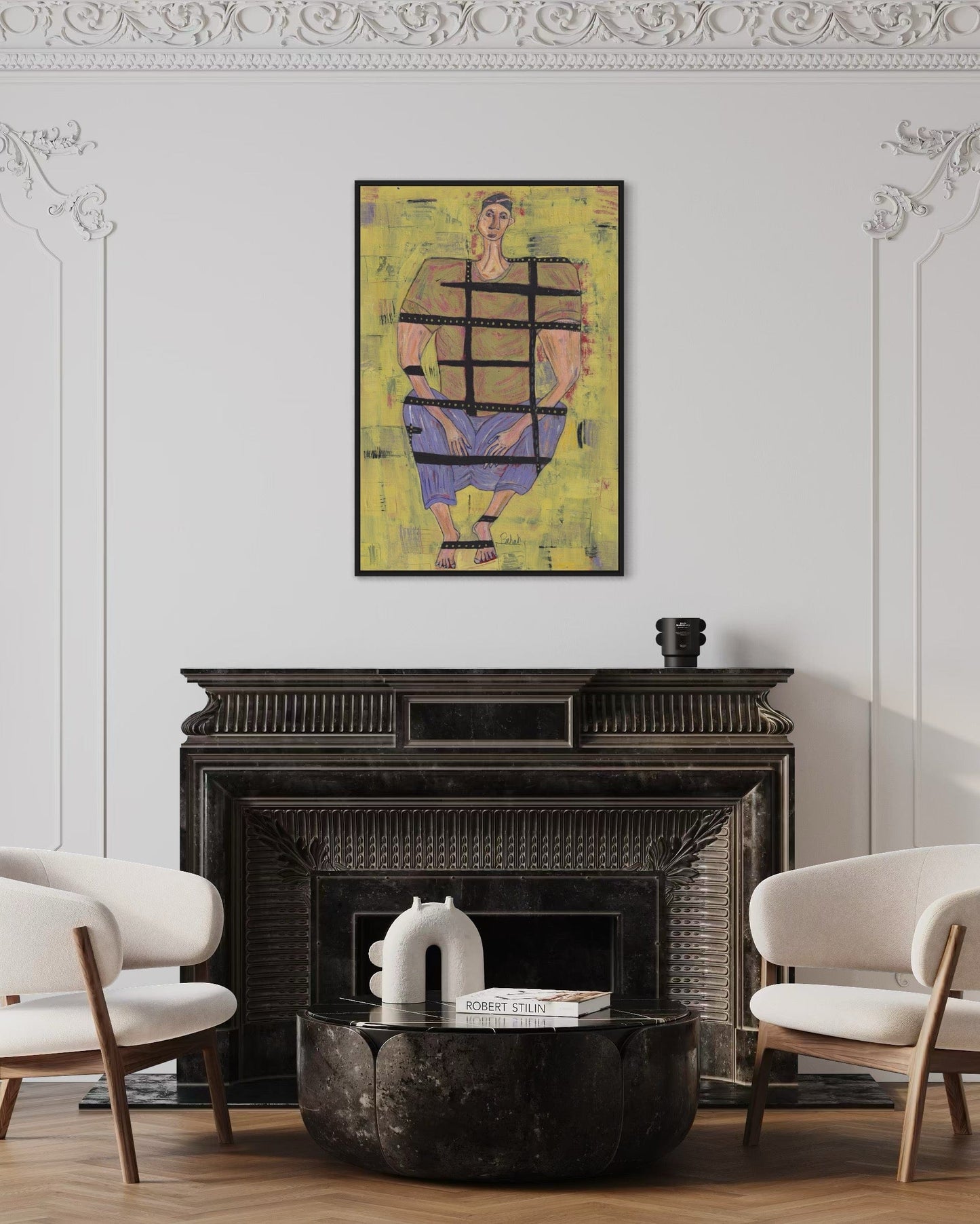 Living room with a fireplace, two chairs, and a colorful abstract painting above the mantel.