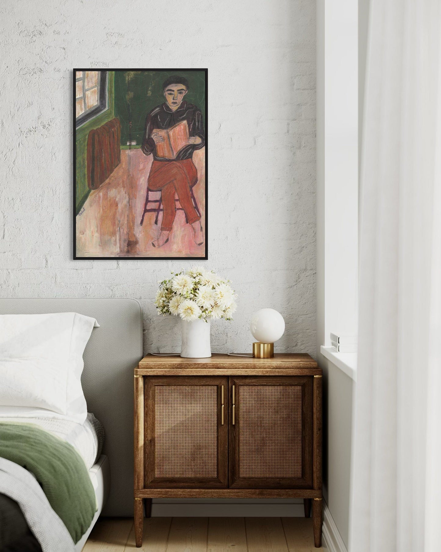 Room interior with a painting on the wall, a wooden cabinet, and a vase with flowers.
