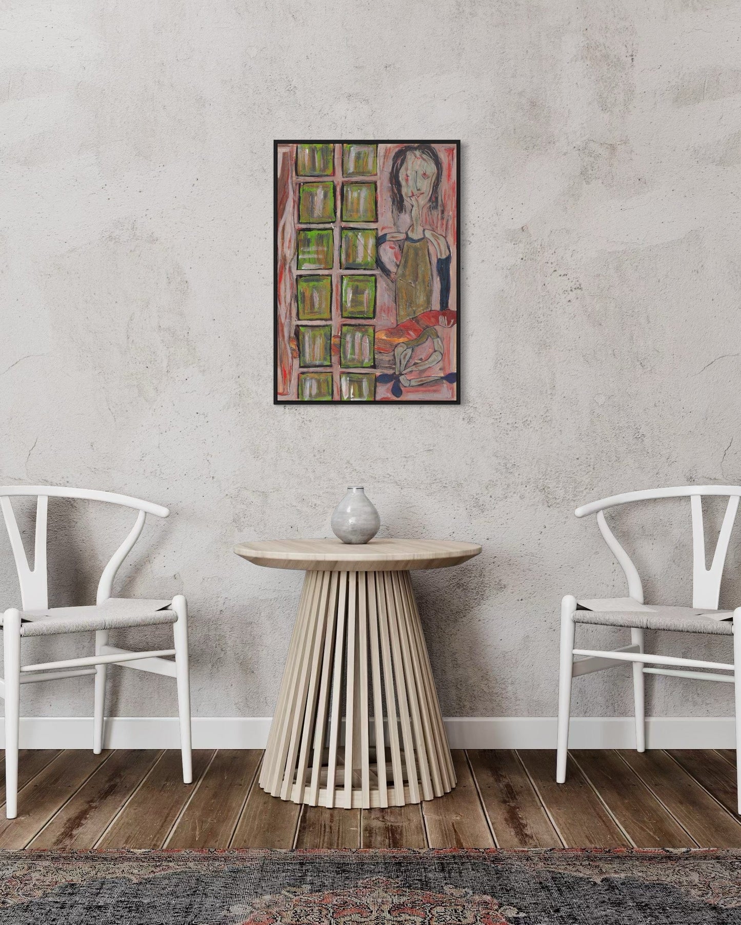 Room interior with a table and chairs against a gray wall with a colorful abstract painting.