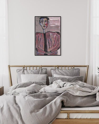 Bedroom with a bed and wall art on a white wall