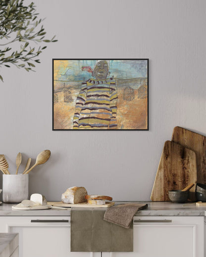 Framed abstract art piece on a wall above a kitchen counter with wooden cutting boards and kitchen utensils.