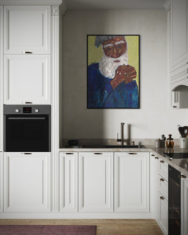 Modern kitchen with white cabinets, black appliances, and a colorful painting on the wall.