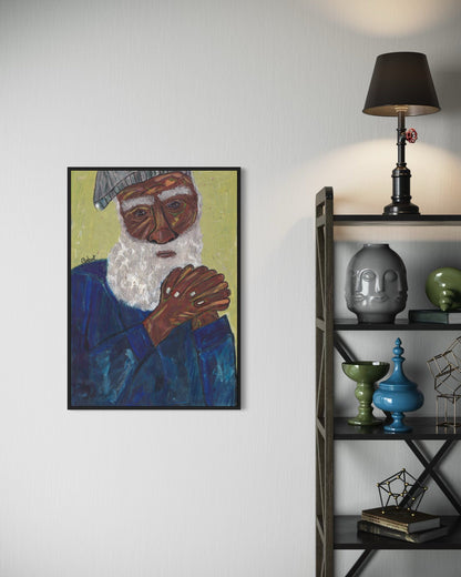 Framed artwork of a man with a beard on a wall next to a shelf with decorative items.