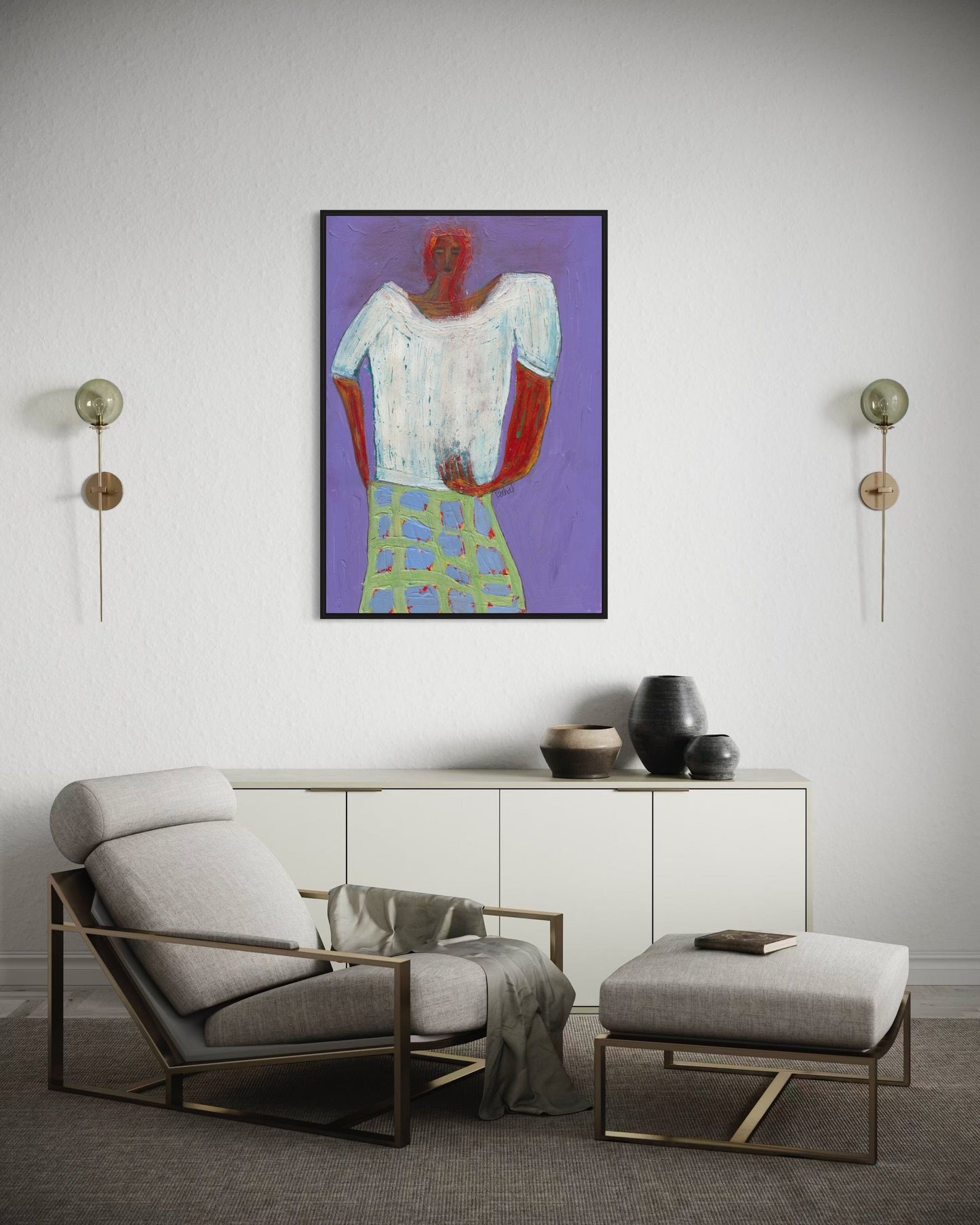 Modern living room with a chair, ottoman, and abstract painting on the wall.