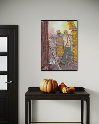Framed artwork on a wall above a dark wooden table with pumpkins.