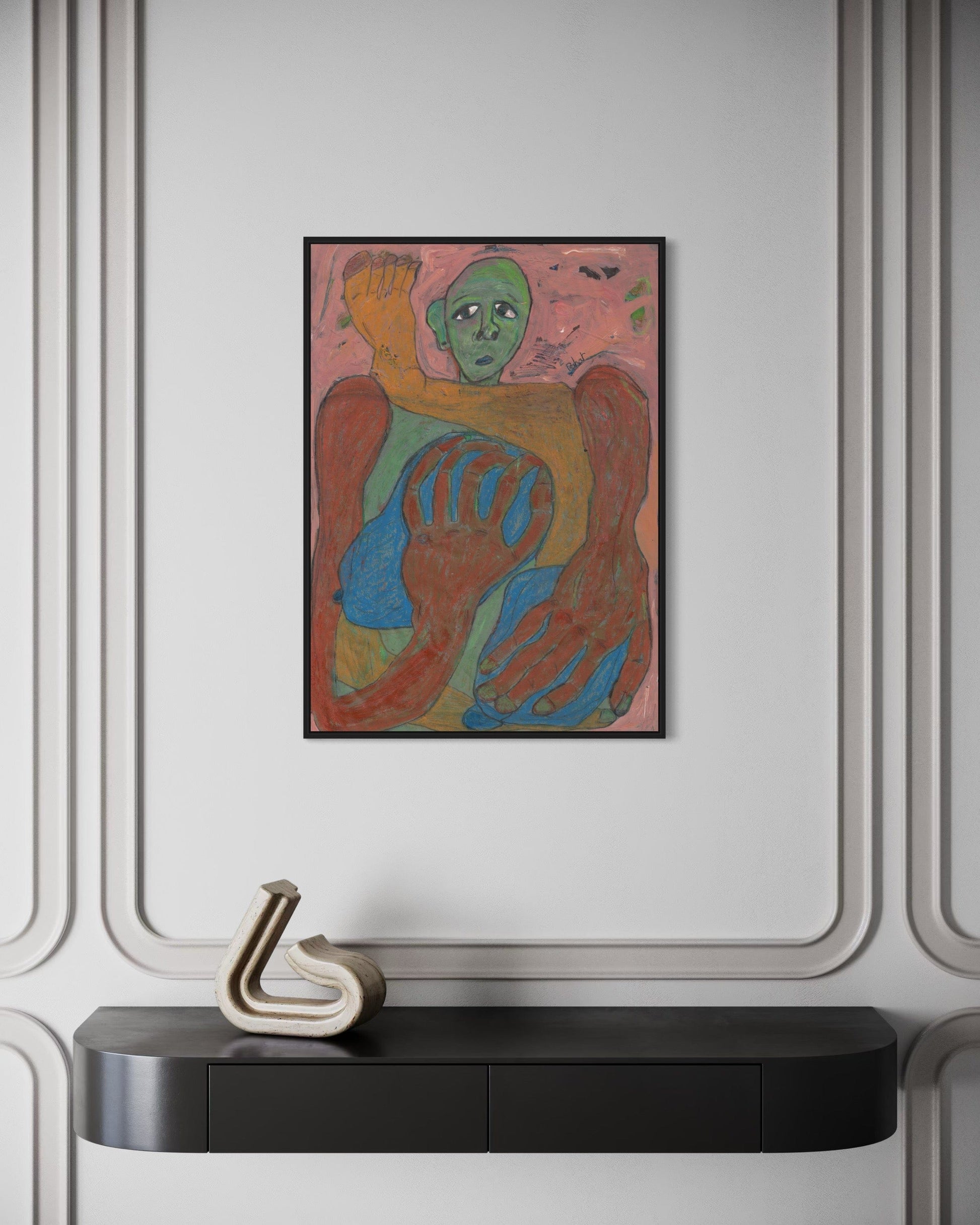 Colorful abstract painting on a wall above a black console table with a decorative object.