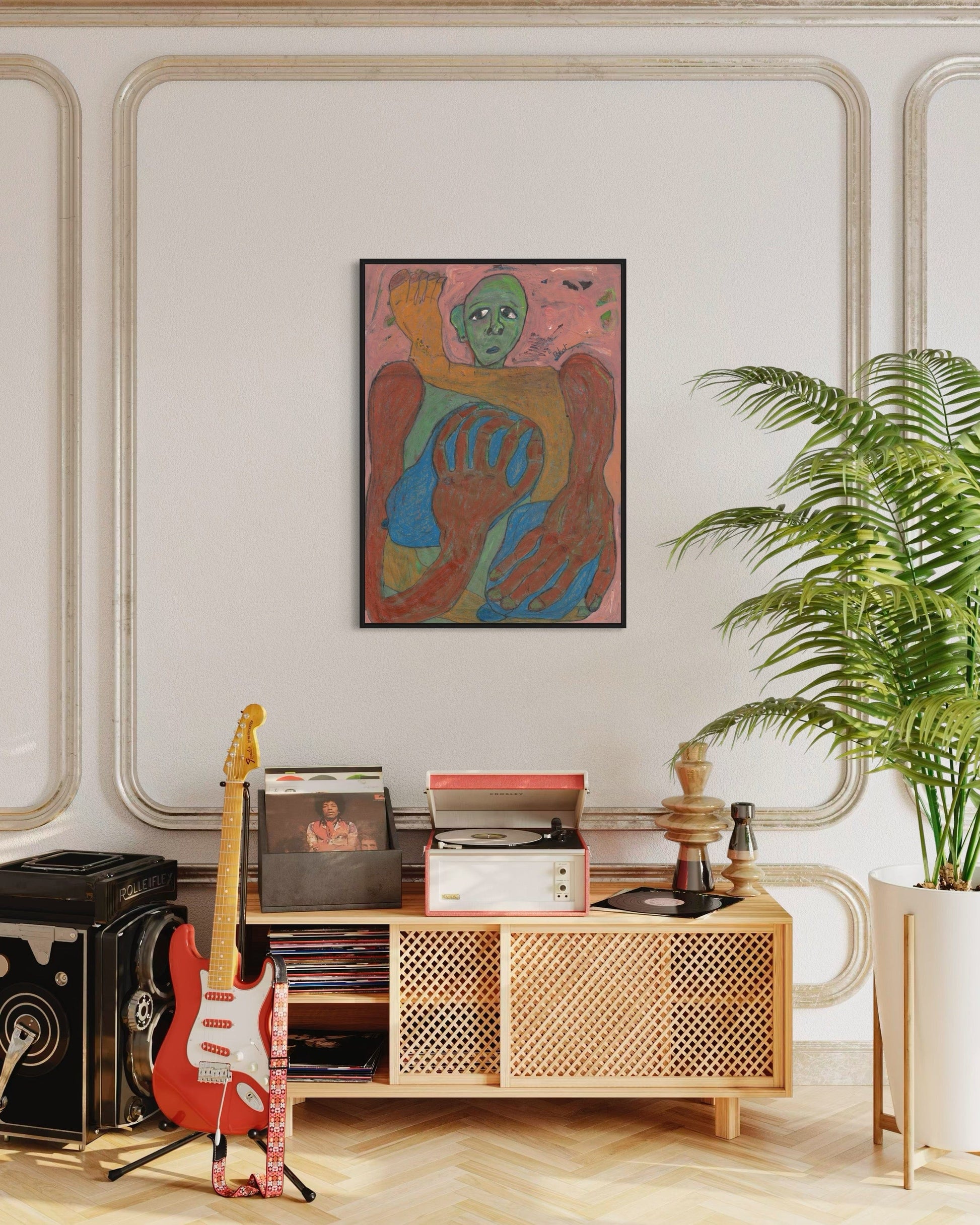 Living room with a wooden cabinet, guitar, records, and a colorful abstract painting on the wall.
