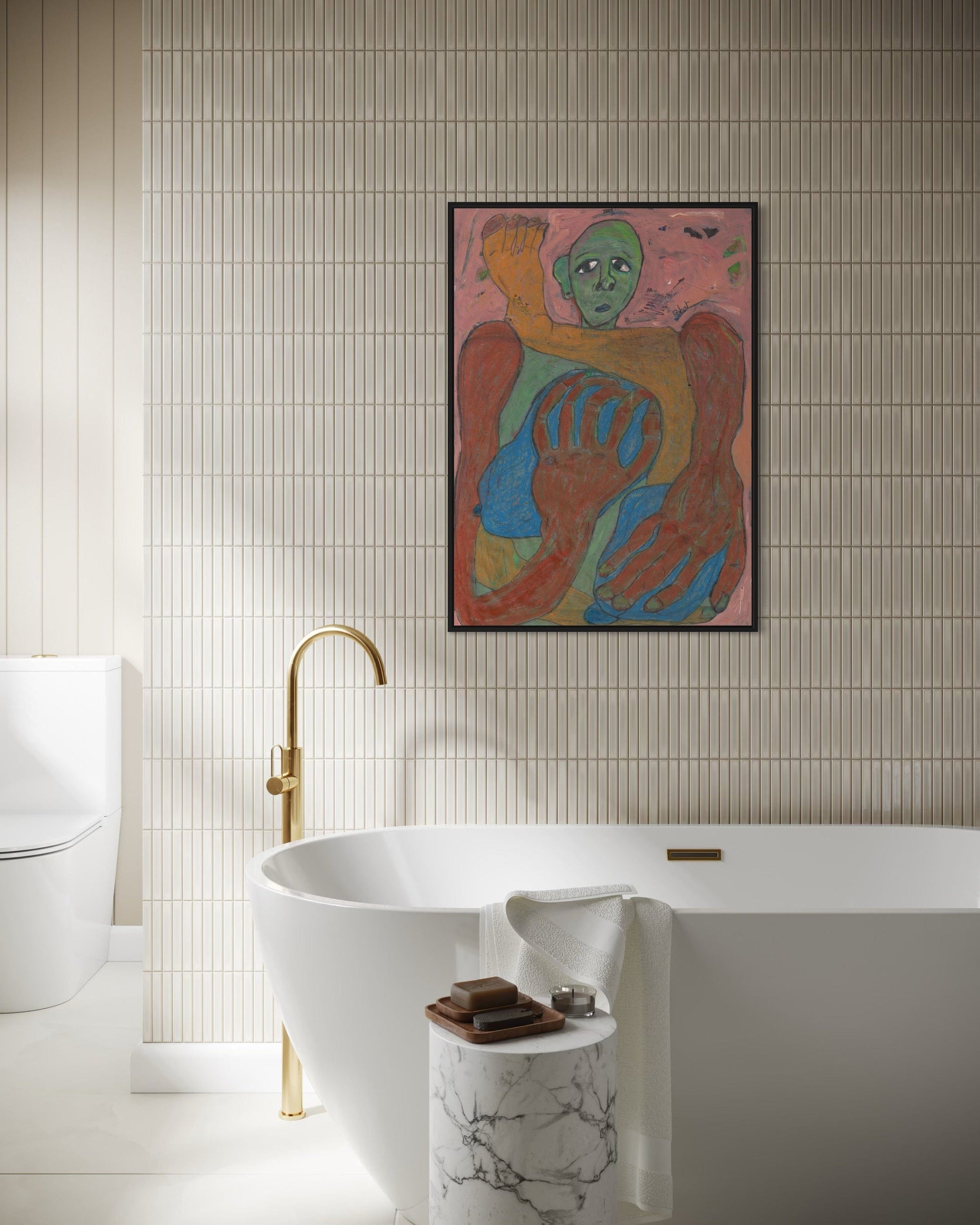 Bathroom with a freestanding bathtub, gold faucet, and colorful abstract painting on the wall.
